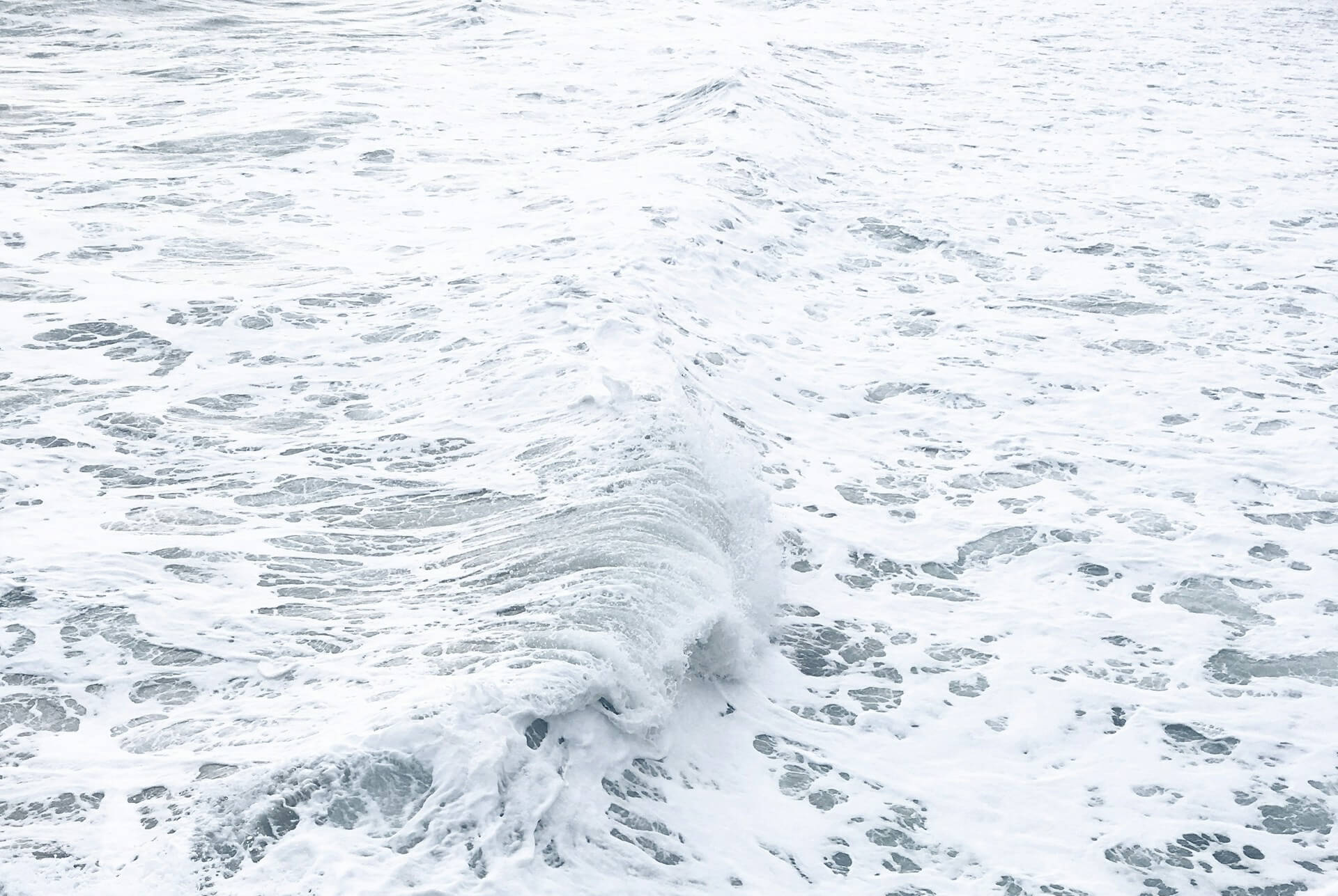 A cozy living room with acoustic panels and a white noise machine
